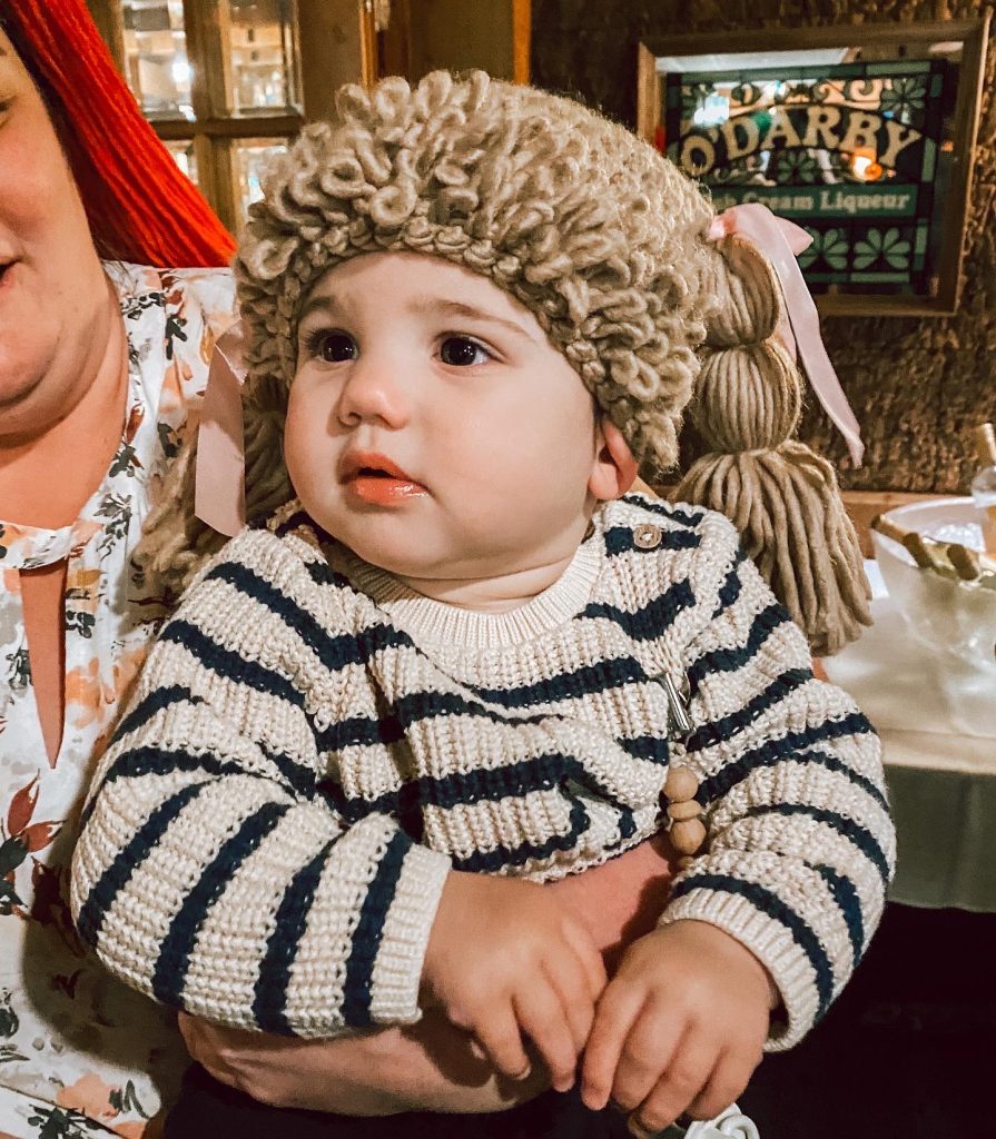 Baby in cabbage patch wig