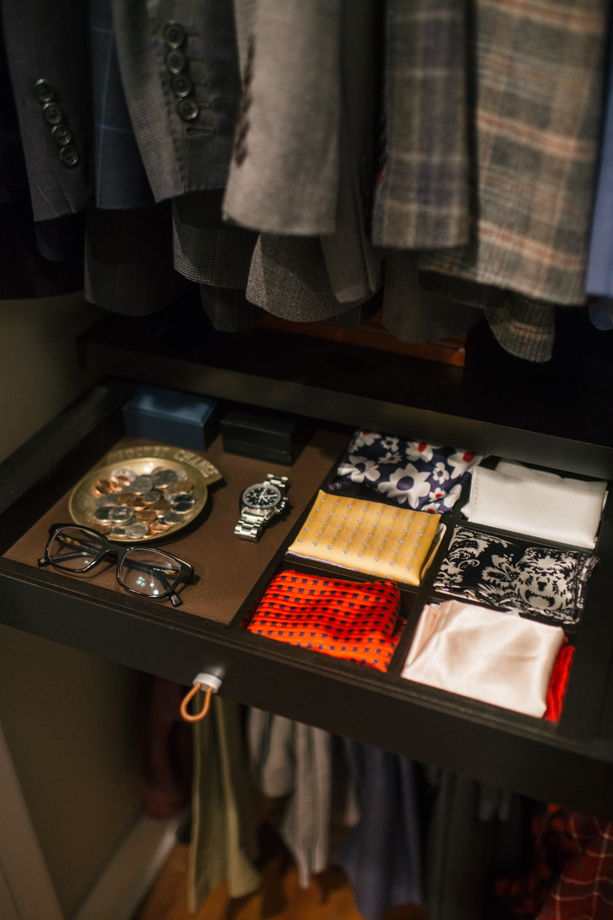 Our favorite features:  Elfa accessory drawer for catch-all items + pocket squares