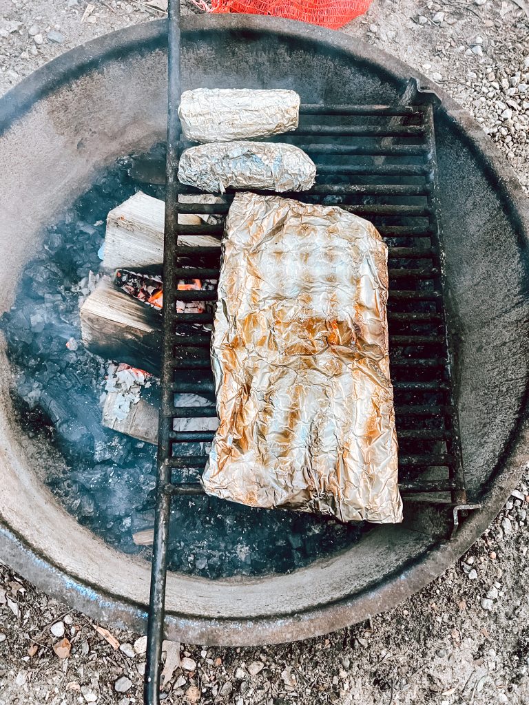 grilling food while camping