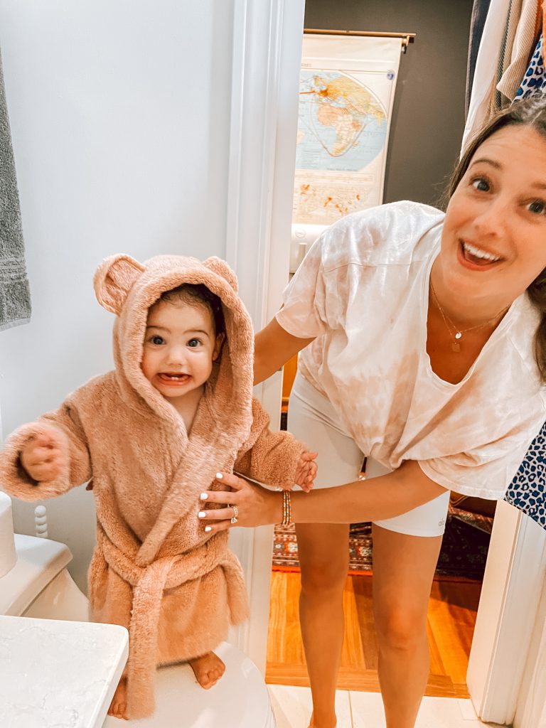 Toddler wearing bear robe