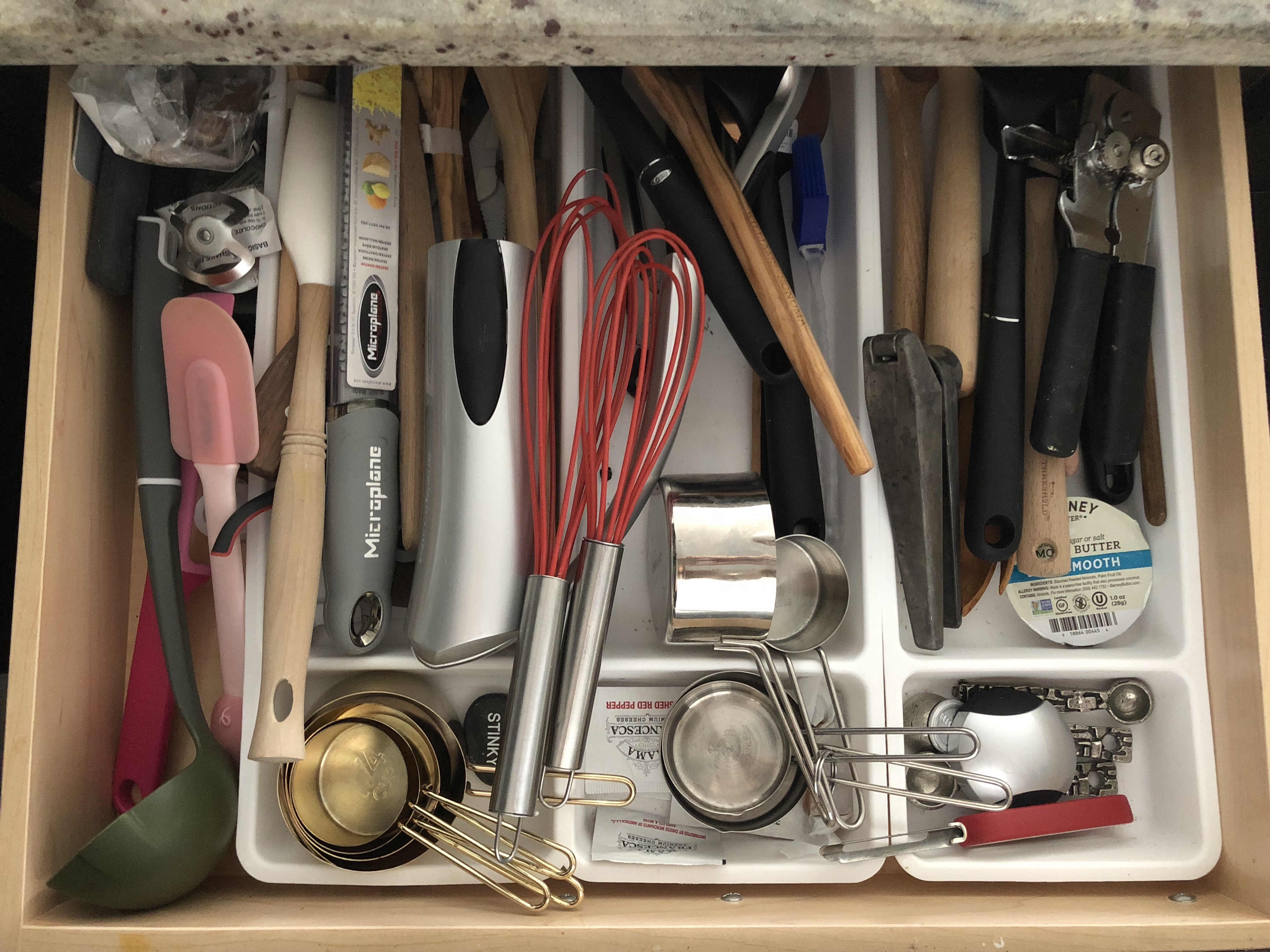 Utensil drawers: Before–organized by 4 year olds–or Satan? You decide.