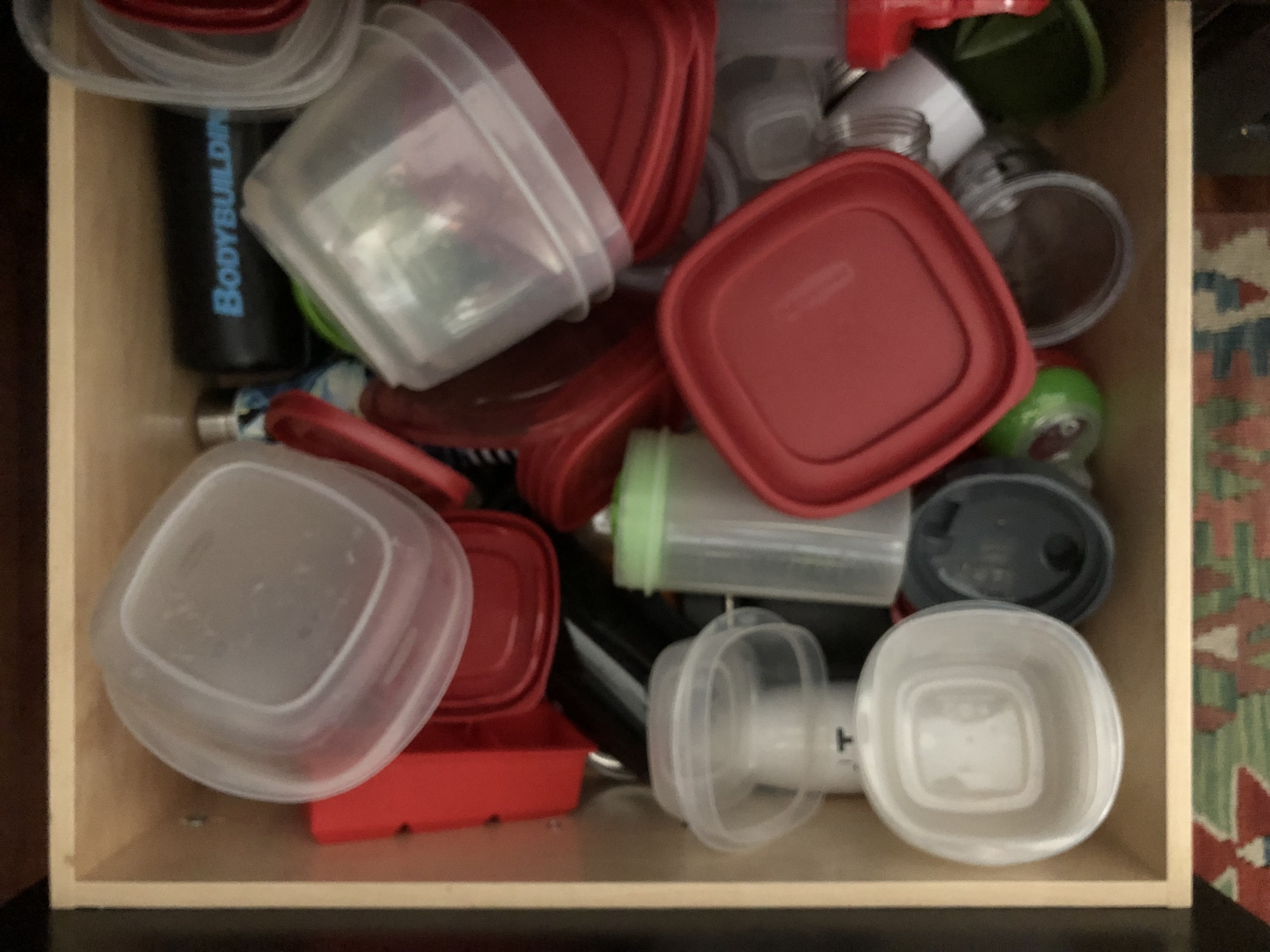 unorganized kitchen drawers before being organized