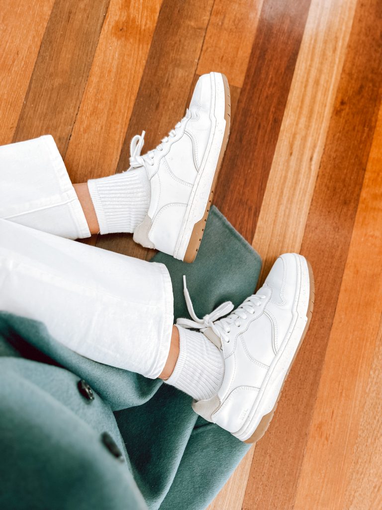 white jeans and white sneakers