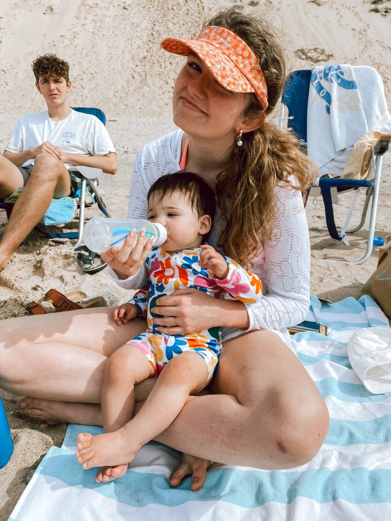 Cousins feeding baby milk