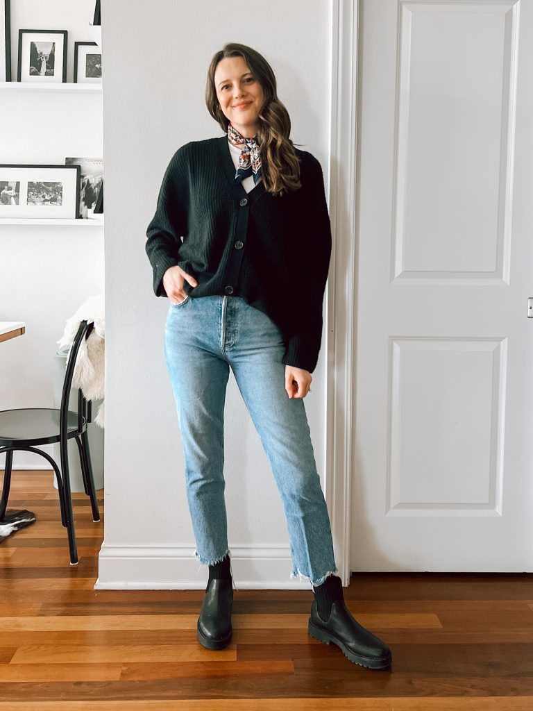 Black cardigan outfit with jeans and lug sole boots. Plus, my Quince cashmere boyfriend cardigan review